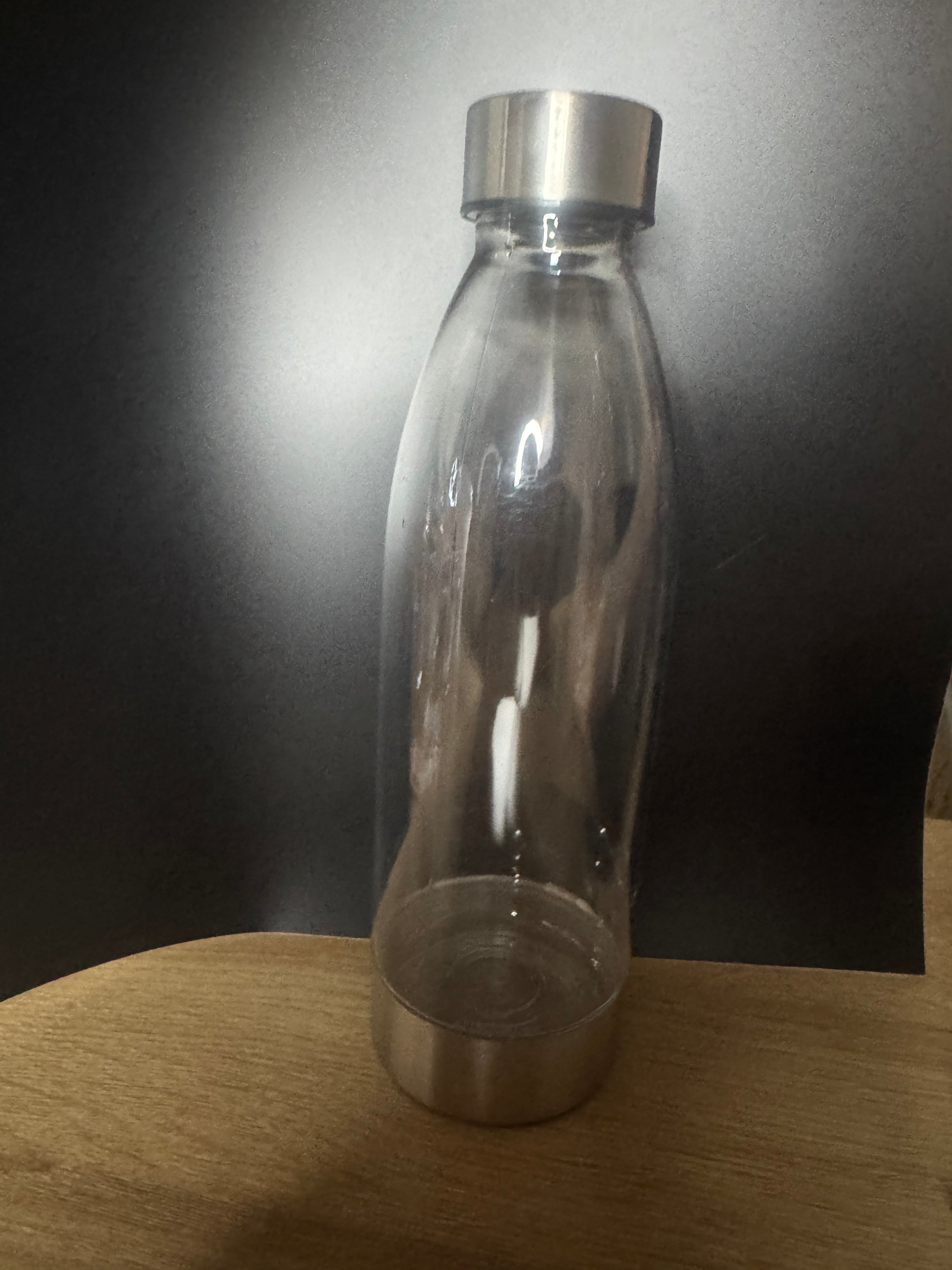 Plastic bottle with stainless steel lid